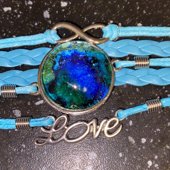 Blue Faux Leather Bracelet with Hand Painted Alcohol Ink Art Under Domed Glass - Picture 1 of 2